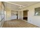 Enclosed patio with ceiling fan, tile floor, laundry hookups, and access to the home at 2819 Swifton Dr # 9, Sarasota, FL 34231