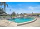 Community pool with various chairs available for residents at 2819 Swifton Dr # 9, Sarasota, FL 34231