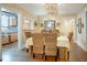Formal dining room boasts wood floors, and a decorative chandelier at 316 29Th W St, Bradenton, FL 34205