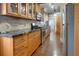 Updated kitchen featuring wood cabinets, stainless steel appliances, and stylish backsplash for a modern feel at 316 29Th W St, Bradenton, FL 34205