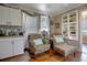 Cozy living room features hardwood floors, natural light, and comfortable seating at 316 29Th W St, Bradenton, FL 34205