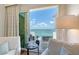 Relaxing balcony area featuring an ocean view, and outdoor seating at 340 Gulf Of Mexico Dr # 136, Longboat Key, FL 34228