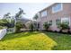Spacious backyard featuring a screened-in pool, offering ample room for recreation and outdoor activities at 3905 Trentwood Pl, Sarasota, FL 34243