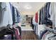 Spacious walk-in closet with custom shelving and organization systems for ample storage at 3905 Trentwood Pl, Sarasota, FL 34243