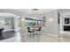 Cozy dining area with a view of the pool and outdoor space at 3905 Trentwood Pl, Sarasota, FL 34243