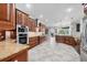 Spacious kitchen layout with a view of the living area at 3905 Trentwood Pl, Sarasota, FL 34243