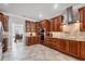 A well-lit kitchen with modern appliances and cabinetry at 3905 Trentwood Pl, Sarasota, FL 34243