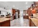 An open kitchen featuring stainless steel appliances and ample cabinet space at 3905 Trentwood Pl, Sarasota, FL 34243