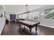 A spacious living room featuring a pool table at 3905 Trentwood Pl, Sarasota, FL 34243
