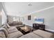 Spacious living room with hardwood floors and ample seating at 3905 Trentwood Pl, Sarasota, FL 34243