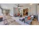 Inviting outdoor patio featuring a summer kitchen, comfortable seating, and access to the home's elegant interior at 3905 Trentwood Pl, Sarasota, FL 34243