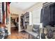 Spacious walk-in closet with custom shelving, a small chair, and room to easily see all clothing at 3905 Trentwood Pl, Sarasota, FL 34243