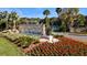 Beautifully landscaped entrance sign to The Meadows community at 4044 Penshurst Park, Sarasota, FL 34235
