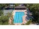 A pristine community swimming pool with plenty of room for laps and relaxation at 4044 Penshurst Park, Sarasota, FL 34235