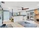 Bright living space with smooth transition from kitchen to living area, featuring backyard access at 428 46Th Nw St, Bradenton, FL 34209
