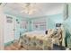 Inviting bedroom with ample natural light, a cozy bed, and closet with mirrored doors at 4312 14Th E St, Ellenton, FL 34222