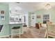 Charming kitchen and breakfast bar features updated appliances, ample counter space, and natural light at 4312 14Th E St, Ellenton, FL 34222