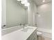 Bathroom boasting a sleek vanity with quartz countertop, toilet and tub/shower combo at 4324 Sea Marsh Pl, Parrish, FL 34219