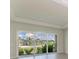 Open living area with large sliding glass doors and backyard views at 4324 Sea Marsh Pl, Parrish, FL 34219