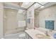 Well-maintained bathroom with a shower-tub combo, vanity, and beach-themed decor at 4360 Presidential Avenue E Cir, Bradenton, FL 34203