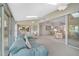 Open floor plan shows sun room with access to the backyard, kitchen and dining room at 4360 Presidential Avenue E Cir, Bradenton, FL 34203