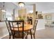 Cozy dining area featuring wood floors and a round table perfect for intimate meals at 4802 51St W St # 1908, Bradenton, FL 34210