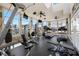 Bright fitness center with various exercise machines and large windows at 4802 51St W St # 1908, Bradenton, FL 34210