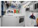 Functional laundry room with a washer, dryer, and ample storage space at 4802 51St W St # 1908, Bradenton, FL 34210