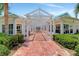 Stunning clubhouse featuring an intricate pergola over a brick walkway at 4802 51St W St # 704, Bradenton, FL 34210
