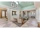 Lobby area featuring tile floors, reception area, seating, and artwork at The Palms of Cortez at 4802 51St W St # 704, Bradenton, FL 34210
