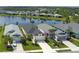 Beautiful single-Gathering homes near a serene lake create an inviting neighborhood atmosphere at 4839 Deep Creek Ter, Parrish, FL 34219