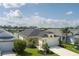 Aerial view of home, showcasing its roof, lawn, landscaping and proximity to a lake at 4839 Deep Creek Ter, Parrish, FL 34219