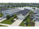 Aerial shot of a home by the lake with lush greenery and scenic views at 4839 Deep Creek Ter, Parrish, FL 34219