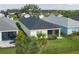 Landscaped backyard with manicured lawn, fence, tasteful landscaping, and screened-in patio at 4839 Deep Creek Ter, Parrish, FL 34219