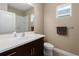 Bright bathroom with a single sink vanity, white countertop, and a toilet at 4839 Deep Creek Ter, Parrish, FL 34219