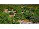 Aerial view of property featuring lush greenery, and clear blue skies at 4876 253Rd E St, Myakka City, FL 34251