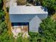 Aerial view showing a metal roof on a modern home with surrounding nature at 4876 253Rd E St, Myakka City, FL 34251