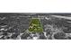 Aerial view of property and home, outlined in white against tree covered landscape at 4876 253Rd E St, Myakka City, FL 34251