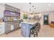 Spacious kitchen features a large island, stainless steel appliances, and custom finishes at 4876 253Rd E St, Myakka City, FL 34251