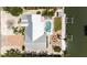 Overhead aerial showcasing home's private yard, dock, pool and proximity to serene bay waters at 519 74Th St, Holmes Beach, FL 34217