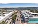 Aerial view featuring the town with restaurants, shops, the harbor, and clear skies at 519 74Th St, Holmes Beach, FL 34217