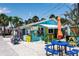 Quaint beach hut with colorful exterior, offering snacks and refreshments, perfect for a beach day at 519 74Th St, Holmes Beach, FL 34217
