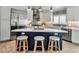 Stylish kitchen with a center island, stainless steel appliances, and pendant lighting at 519 74Th St, Holmes Beach, FL 34217