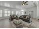 Bright living room with wood floors, comfortable seating, and a serene, inviting atmosphere at 519 74Th St, Holmes Beach, FL 34217
