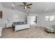 Spacious main bedroom features a vaulted ceiling, coastal decor, and light wood flooring, and doorway to other rooms at 519 74Th St, Holmes Beach, FL 34217