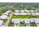 A quiet residential area with meticulously manicured lawns offering a serene and visually appealing neighborhood at 5448 Crestlake Blvd # 158, Sarasota, FL 34233