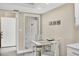 Breakfast nook featuring a white table set, natural light, and neutral wall paint at 5448 Crestlake Blvd # 158, Sarasota, FL 34233