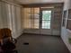 Sunroom featuring lots of natural light and room for relaxing at 5536 Denmark Dr, Bradenton, FL 34207