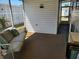 Enjoy the outdoors from inside this delightful sunroom with cozy seating and plenty of natural light at 5536 Denmark Dr, Bradenton, FL 34207
