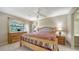 Well-lit bedroom with two windows and tiled floor at 5649 Summerside Ln # 41B, Sarasota, FL 34231